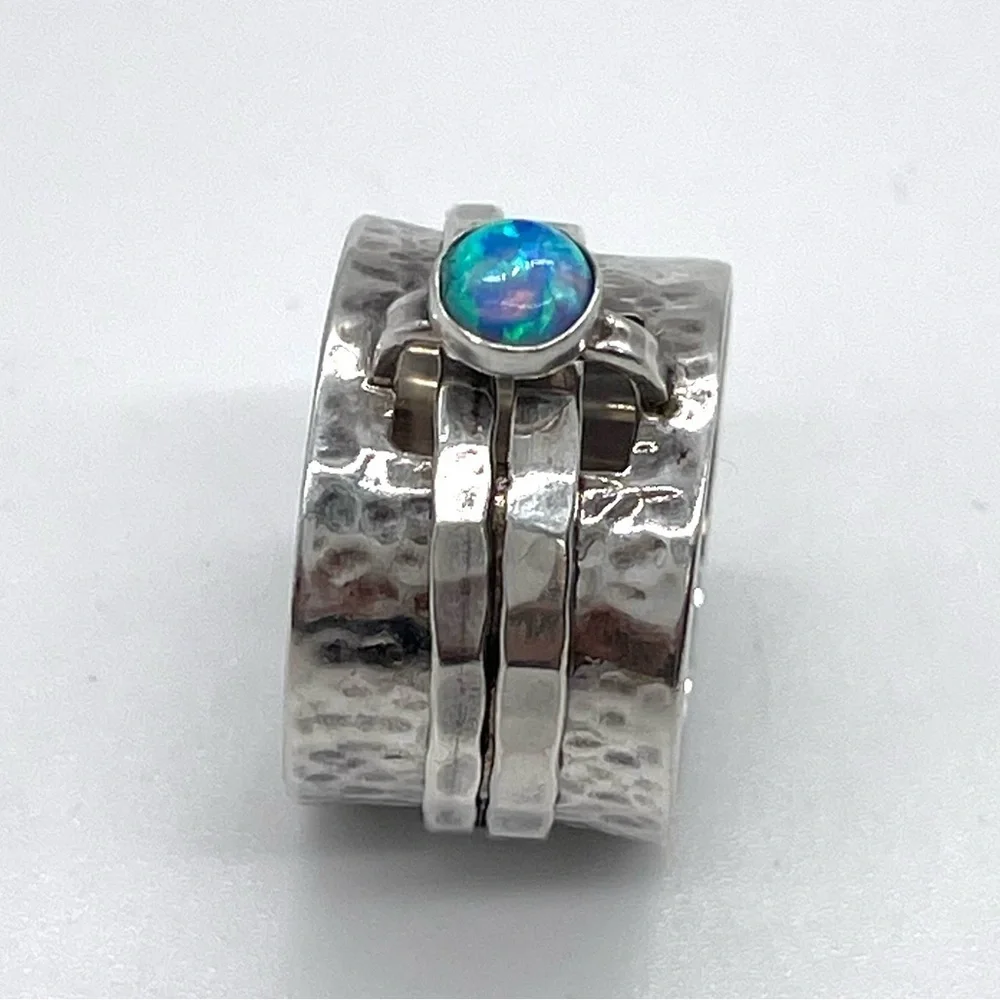 Silpada 925 Hammered Sterling Silver Spinner Ring with Faux Opal accent